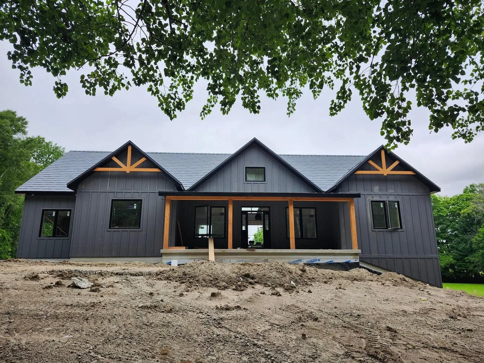 Coleman Finishing exterior work on a Haliburton County home